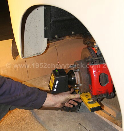 Using a castor camber gauge