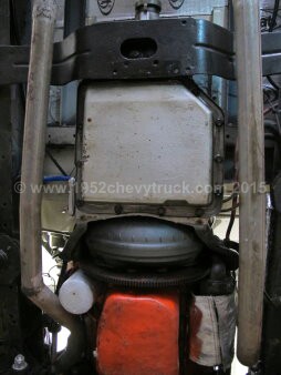 1952 Chevy truck fitting a new transmission.