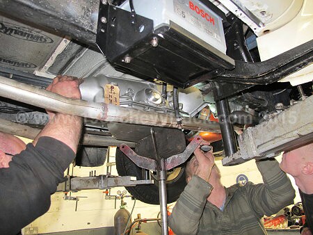 1952 Chevy truck fitting a new transmission.