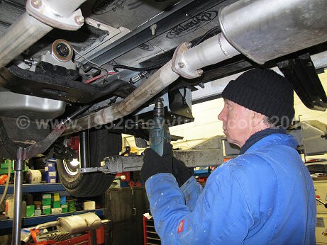 1952 Chevy truck fitting a new transmission.