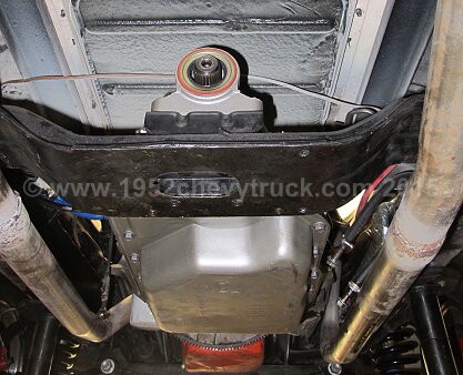 1952 Chevy truck fitting a new transmission.